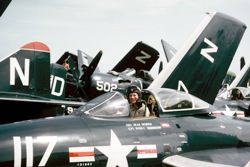 Lt. (jg) Gil Nelson in F9F “Panther” jet aboard carrier Hornet (CVA-12); TDY for CAP (combat air patrol). August 1954