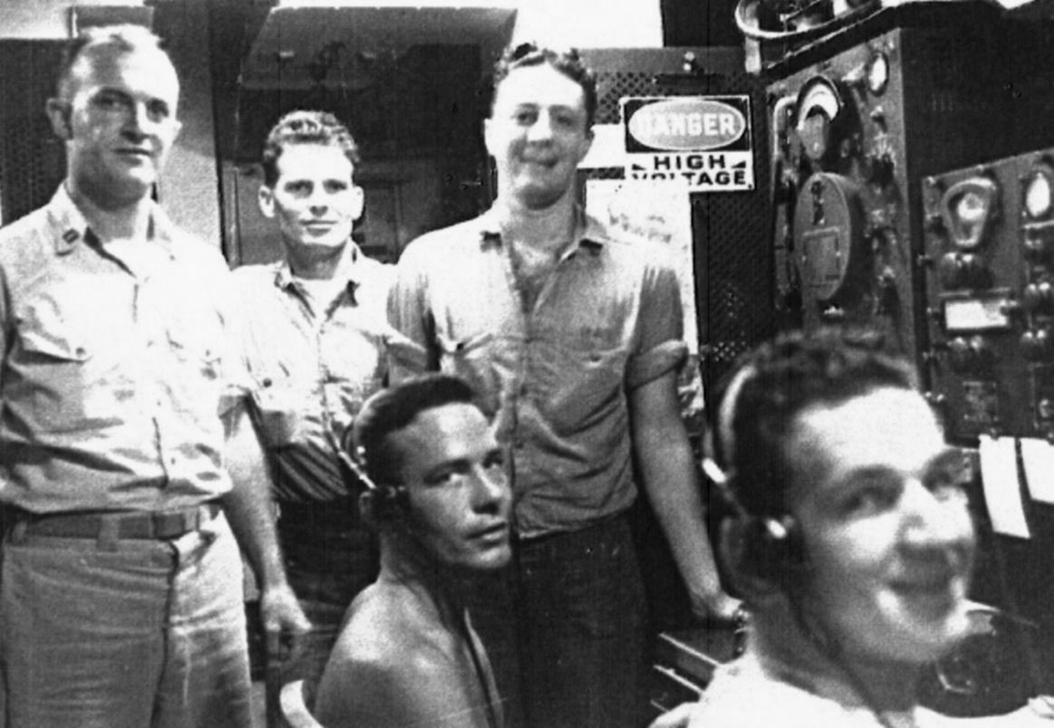 Radio Gang.<br>(L→R) Lt. Magill, W. Bates, B. Brady, R. Raphael, I. McKenzie.