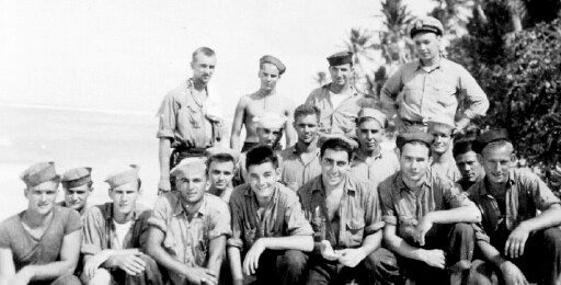 South Seas Liberty.<br>BACK ROW (L→R) [unknown], [unknown], J. Crowe, H. Vincent. MIDDLE ROW (L→R) [unknown], [unknown], [unknown], [unknown], [unknown], [unknown] . FRONT ROW (L→R) J. Beard, B. Hamby, H. Meunsterman, M. Pelligrino, C. Ryan, G. Pacitti, [unknown], V. Olszewski.