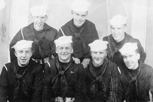 BACK ROW (L→R) B. Pratt, [unknown], [unknown] . FRONT ROW (L→R) [unknown], C. Barrett, W. Sullivan, [unknown].<br>Barrett and Sullivan were from other ships.