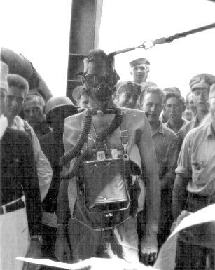 S. Magill in breathing apparatus; 25DEC1943.