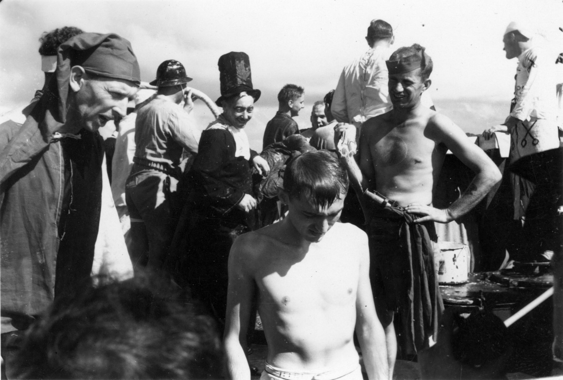 Lt. Hill being harrassed by F. Eames (jester); 25DEC1943.