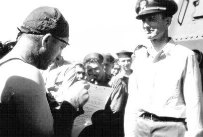 T. Westbrook (Davey Jones) tells off Lt Cdr Dornin; 25DEC1943.