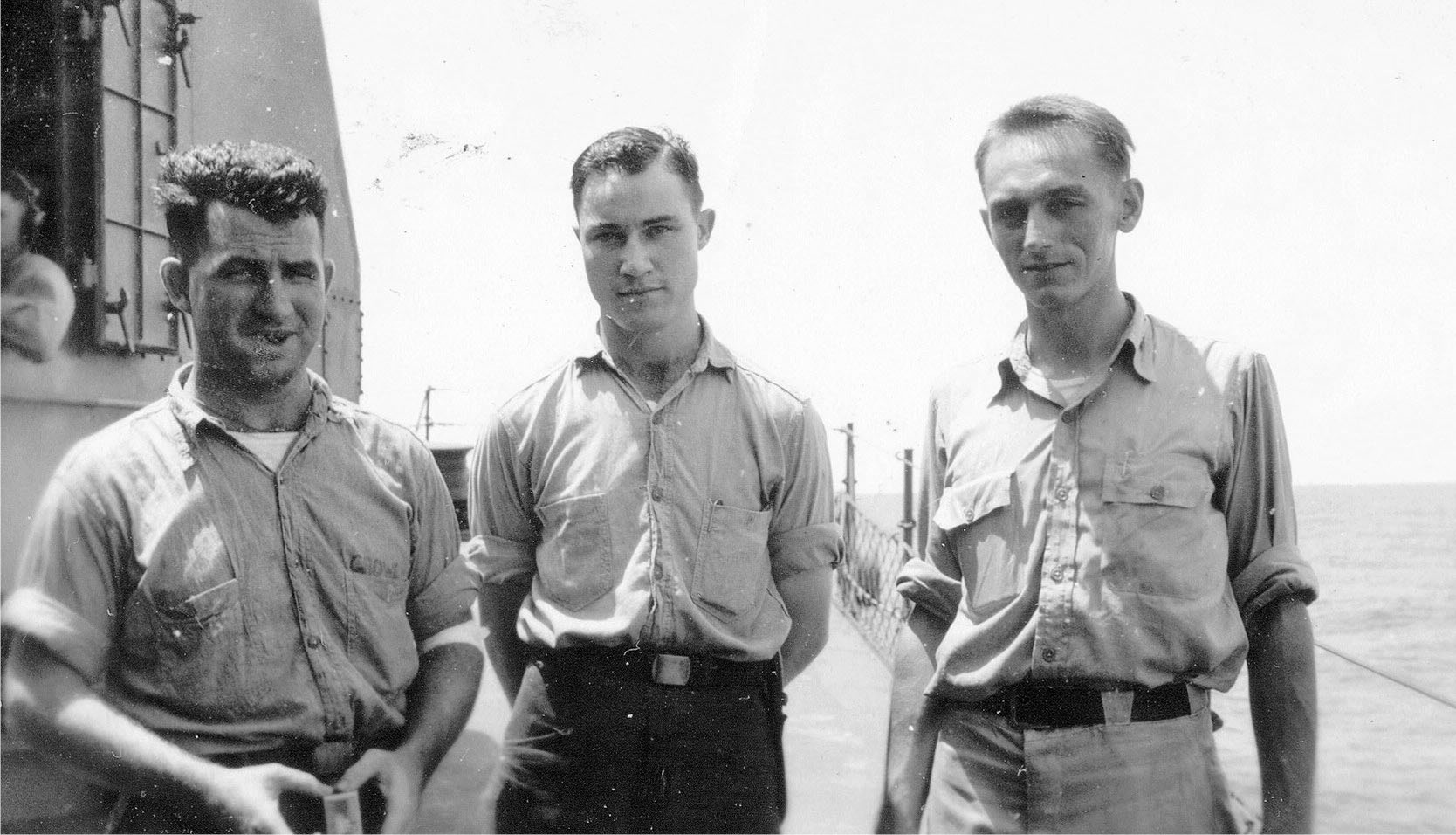 Supply Dept.<br>(L→R) J. Crowe, T. Perrin, Lt. Hill.