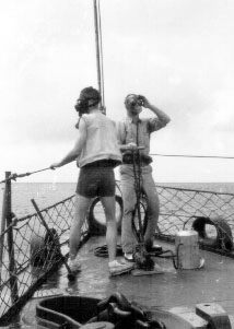 H. Benoit, S. Magill on watch; 25DEC1943.