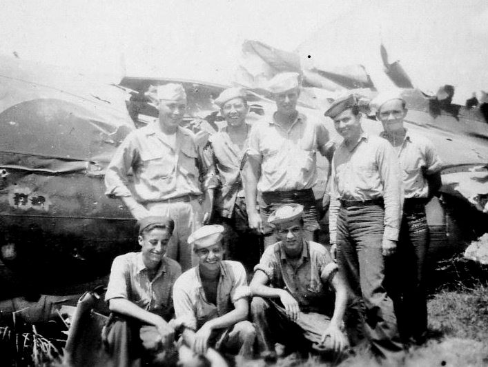 Destroyed Japanese Mitsubishi G4M-1 “Betty” bomber.<br>BACK ROW (L→R) H. Vincent, C. Angevine, UNK, C. Brannon, P. Withers.<br>FRONT ROW (L→R) W. Biers, M. Rupert, J. Beckham.
