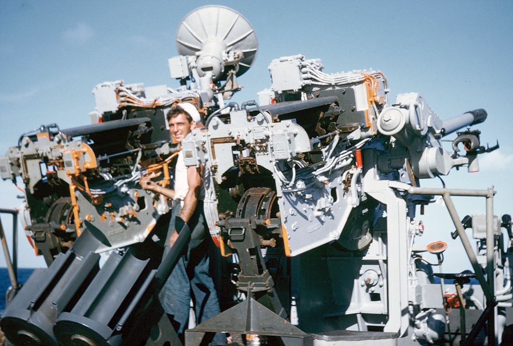 GM2 Lafontaine performing routine maintenance on his twin 3”/50s.